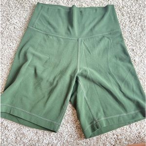 Aritzia TNA biker shorts in green